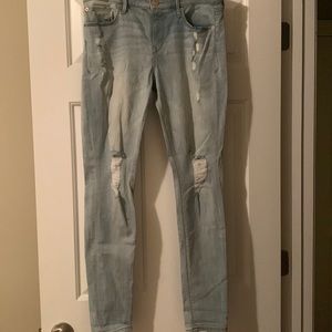 Express distressed jean leggings. Mid rise. Size 8R